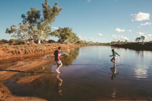 Wooleen with people in water